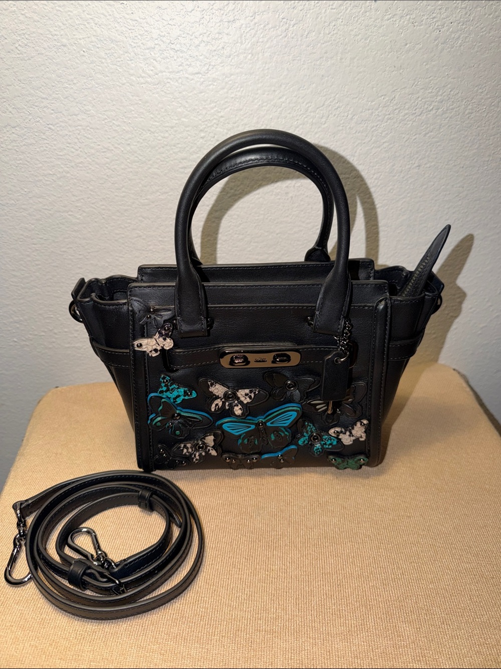 Coach NWOT Black Leather Butterfly Embellished Swagger 21 Carryall Bag